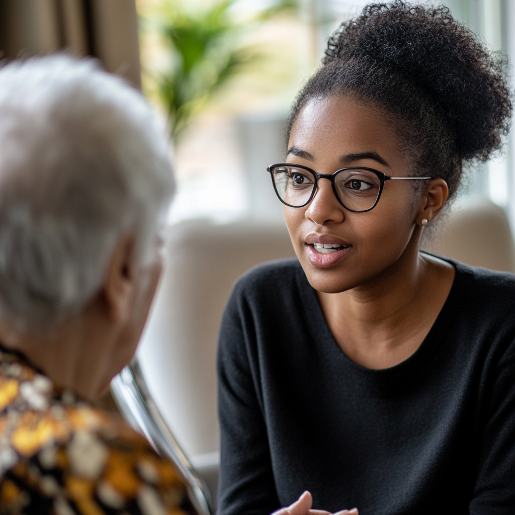 agent speaking with elderly woman